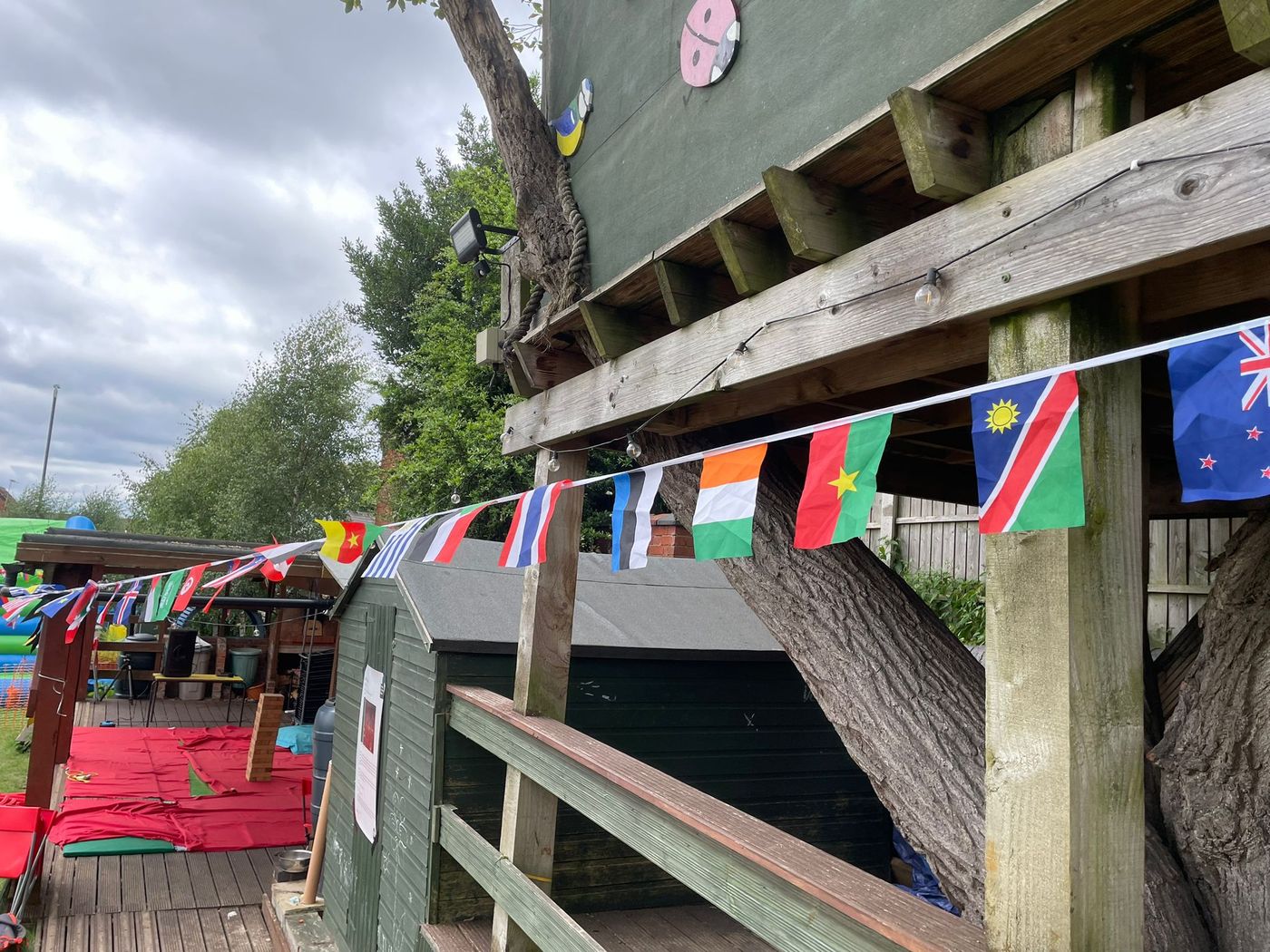 Billy in conversation with community members at the garden party