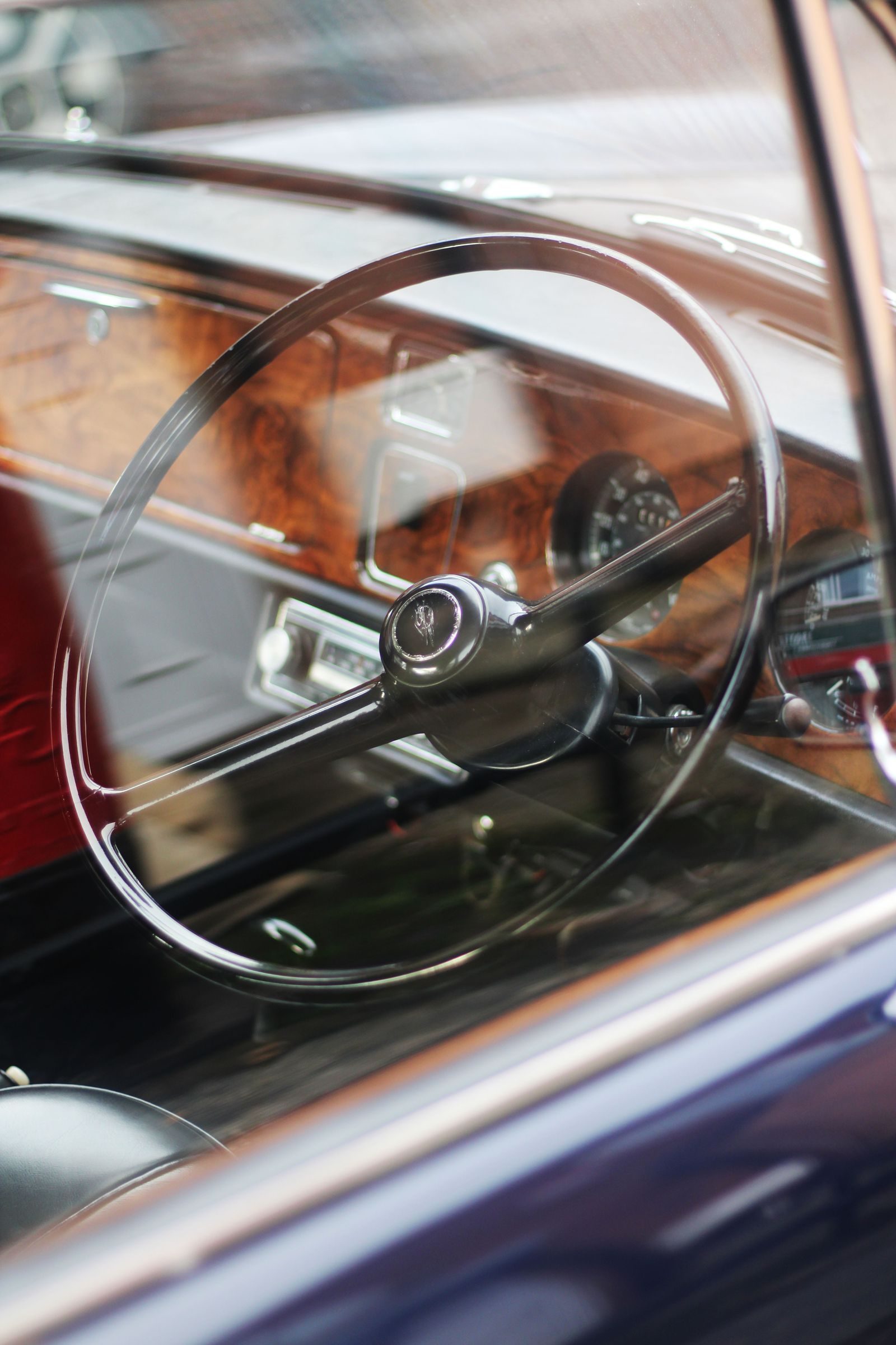 Vintage car steering wheel — period vehicle on set