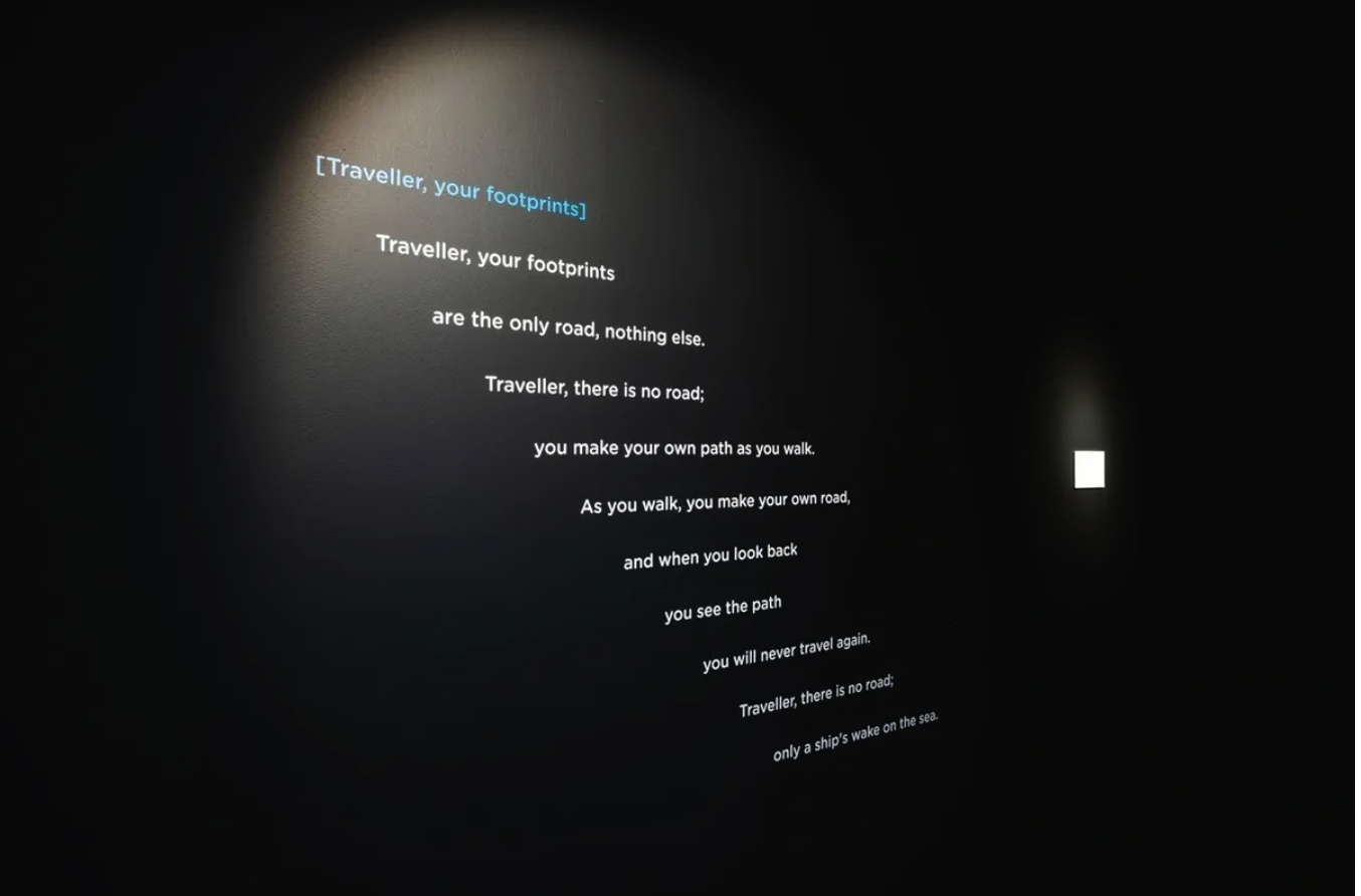 Screening room setup with monitor, The Exiles exhibition