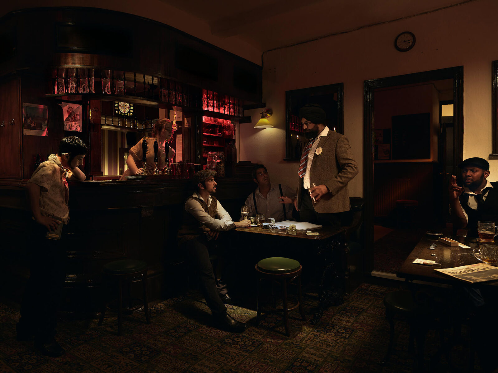 PayDay, red light bathes the bar, men carouse on payday, placing their money in the centre for the ritual of Cooth, a loan system between friends