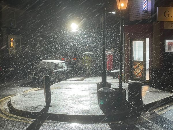 Snow falling at night on the set — atmospheric conditions during the shoot