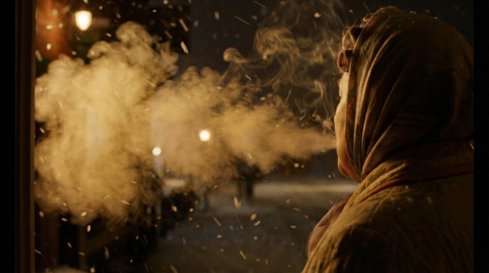 Weathered hands against steam — the physicality of empire worker labour